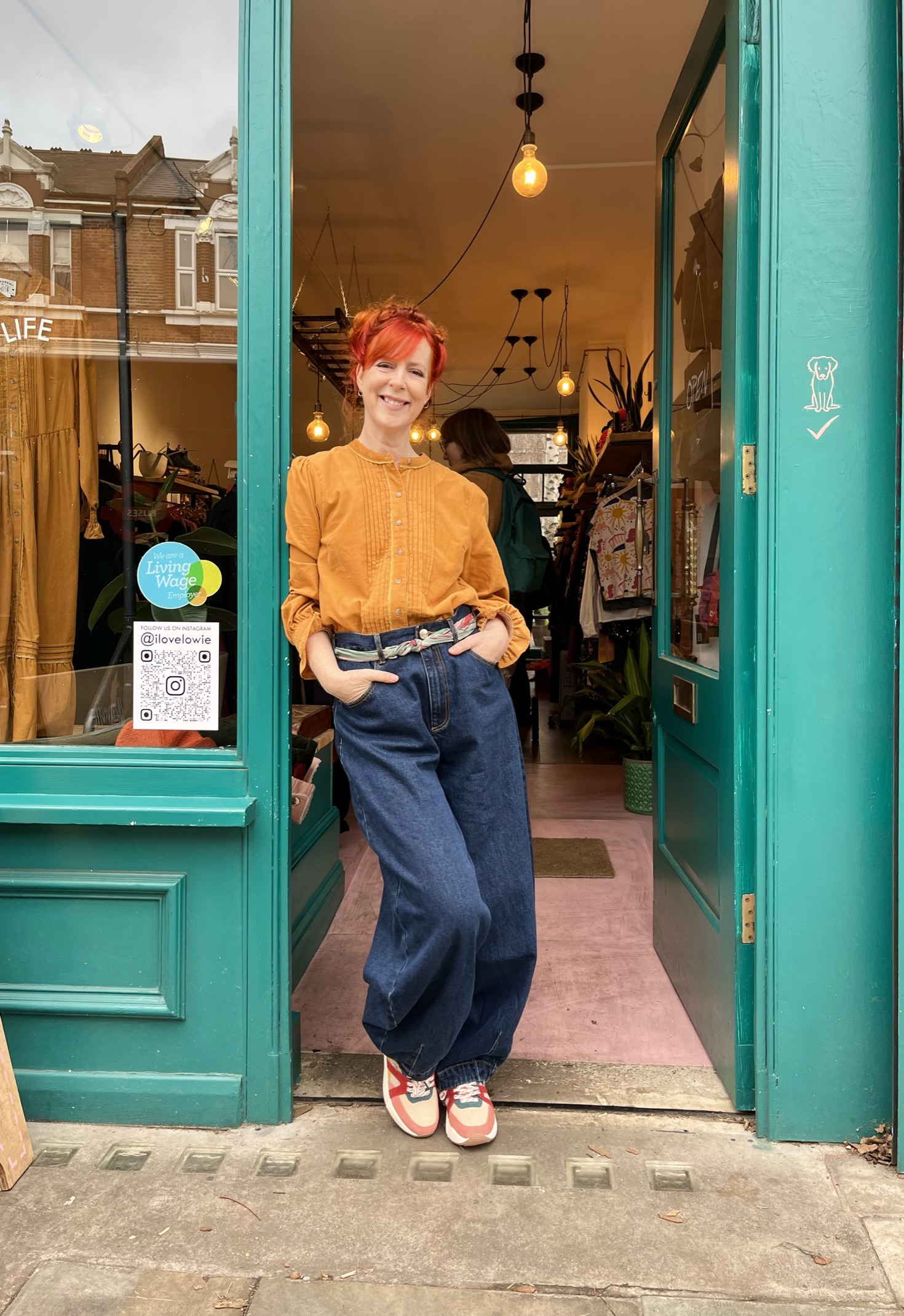 Incredibusy Ali Clifford outside client Lowie shop in Herne Hill